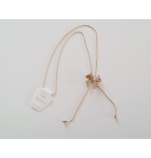 Collier avec pendentif nœud à strass réglable